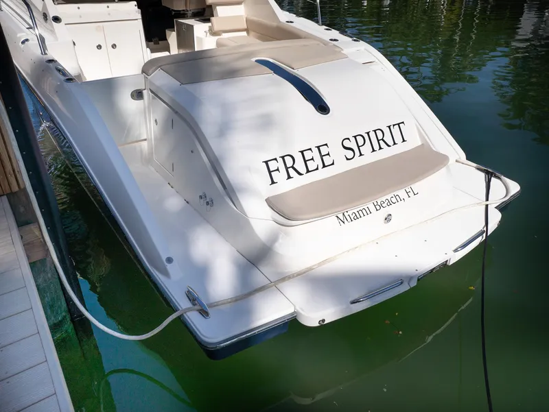 Slide: The Image of 2014 Pursuit SC 365i Sport Coupe named "Free Spirit" docked in Miami Beach, FL. - 3