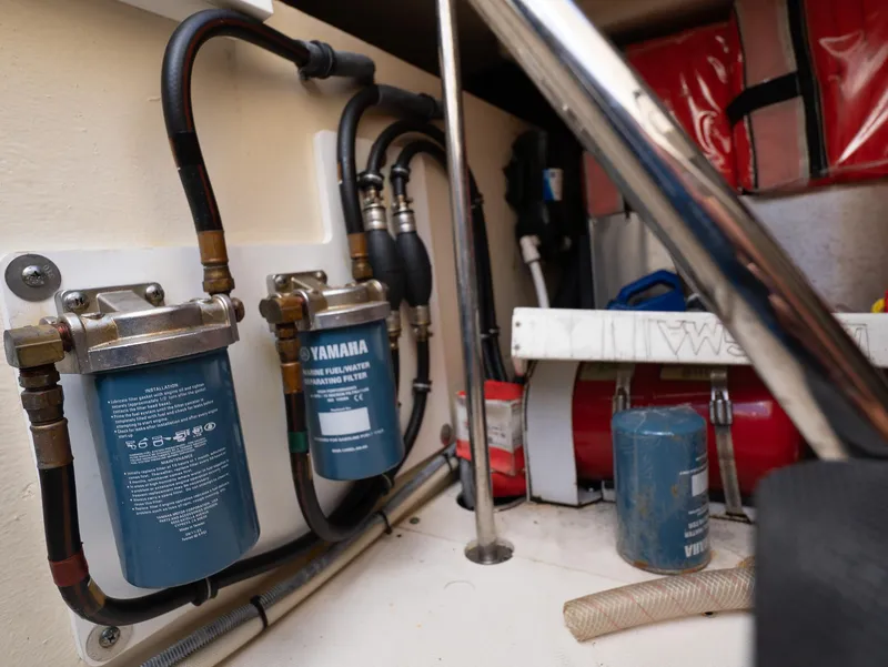 Slide: The Image of Engine compartment of 2014 Pursuit SC 365i Sport Coupe with Yamaha fuel filters. - 33