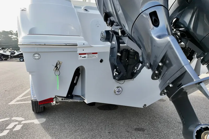 Slide: The Image of Rear view of 2026 Sea Fox 268 Commander boat with dual outboard motors. - 4