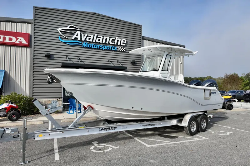 Slide: The Image of 2026 Sea Fox 268 Commander boat on trailer at Avalanche Motorsports dealership. - 7