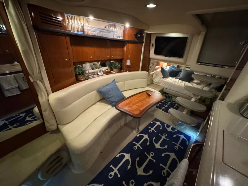 Slide: The Image of Luxurious interior of 2007 Sea Ray 340 Sundancer yacht with elegant seating and nautical decor. - 14