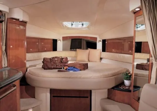 Slide: The Image of Luxurious interior of 2007 Sea Ray 340 Sundancer yacht with elegant furnishings. - 24