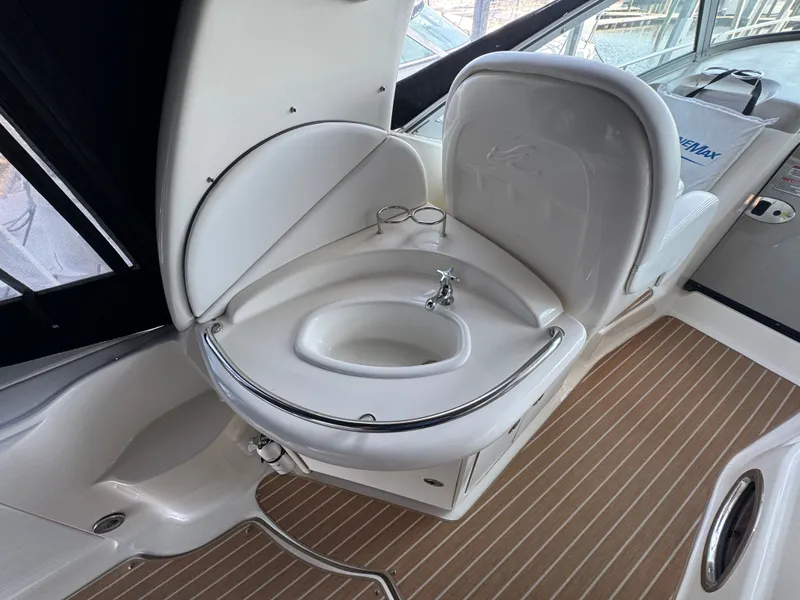 Slide: The Image of 2007 Sea Ray 340 Sundancer boat interior with compact sink and faucet. - 9