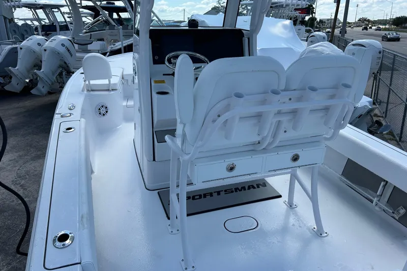 Slide: The Image of 2025 Sportsman Masters 227 Bay Boat interior with dual seating and console. - 16