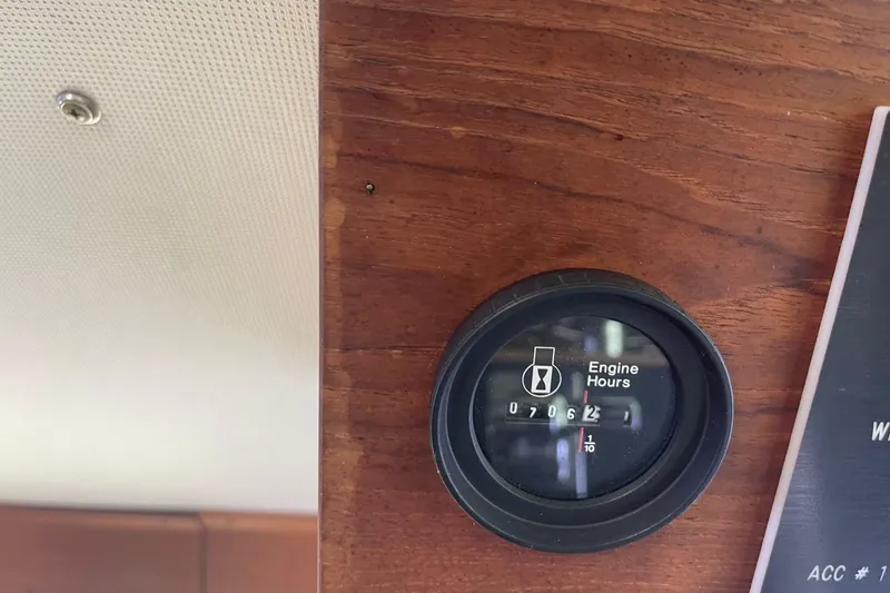 Slide: The Image of Engine hour meter on 1985 Marinette DC 39, displaying 7062.1 hours. - 28