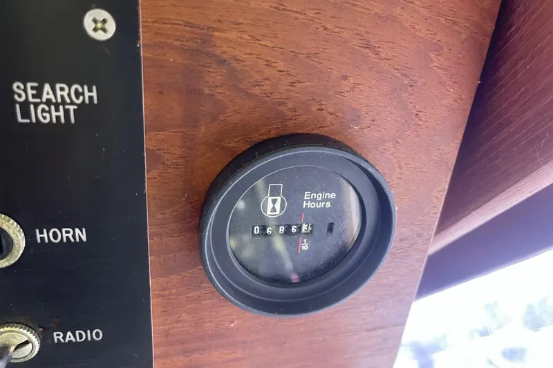 Slide: The Image of Control panel of 1985 Marinette DC 39 boat showing engine hours gauge. - 29