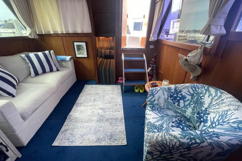 Slide: The Image of Interior of 1985 Marinette DC 39 yacht with cozy seating and nautical decor. - 35