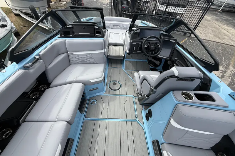 Slide: The Image of 2026 Supa SA 550 boat interior with modern seating and sleek design. - 11