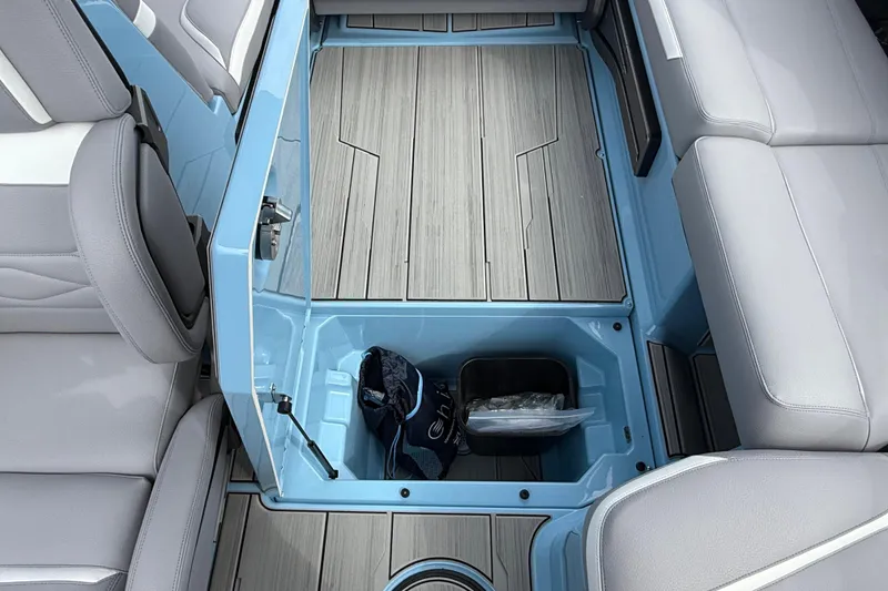 Slide: The Image of Interior of 2026 Supa SA 550 boat with storage compartment and seating. - 19