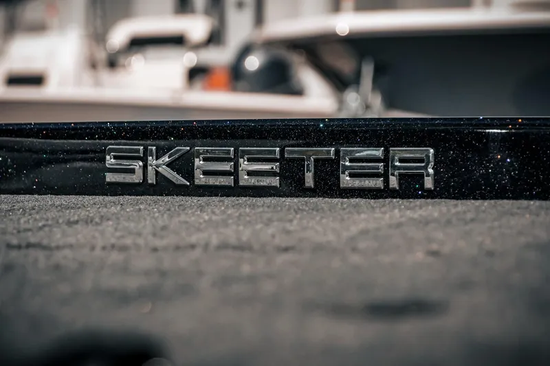 Slide: The Image of 2024 Skeeter ZX200 logo on textured surface, showcasing sleek design. - 17