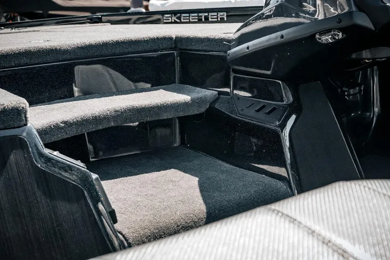 Slide: The Image of 2024 Skeeter ZX200 boat interior with carpeted flooring and sleek design. - 31