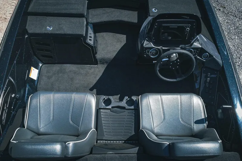 Slide: The Image of 2024 Skeeter ZX200 boat interior with dual seats and steering console. - 7