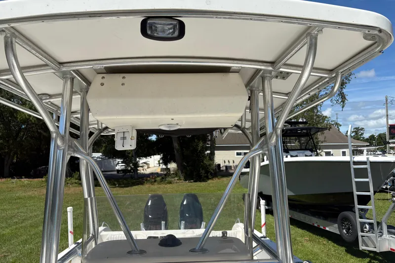 Slide: The Image of 2004 Sea Chaser 2300 Offshore boat with T-top and stainless steel frame. - 17