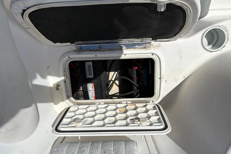 Slide: The Image of Open battery compartment on 2004 Sea Chaser 2300 Offshore boat. - 20
