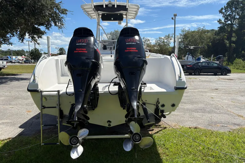 Slide: The Image of 2004 Sea Chaser 2300 Offshore boat with dual Suzuki 140 outboard motors. - 4