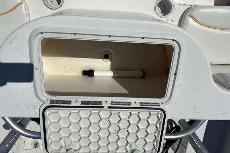Slide: The Image of Open storage compartment on a 2004 Sea Chaser 2300 Offshore boat. - 6