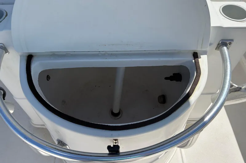 Slide: The Image of Open storage compartment on a 2004 Sea Chaser 2300 Offshore boat. - 8