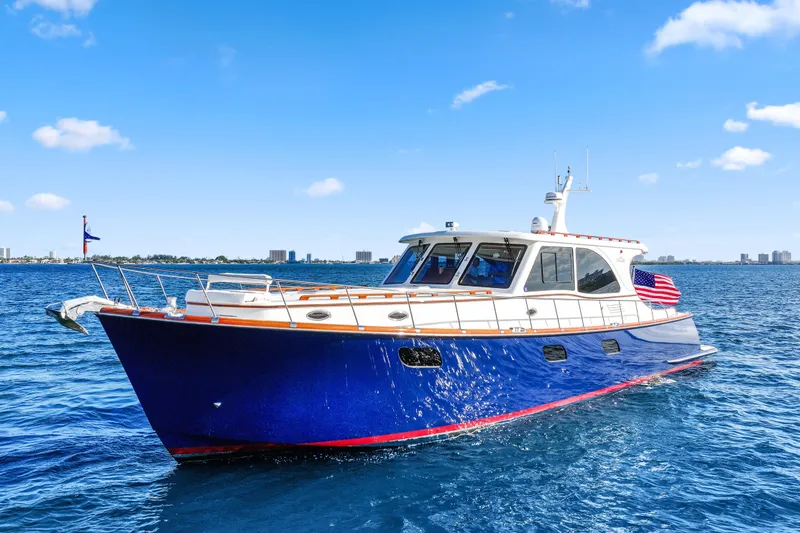 The Image of 2023 Vicem 65 Classic yacht cruising on open water under a clear blue sky. - 0