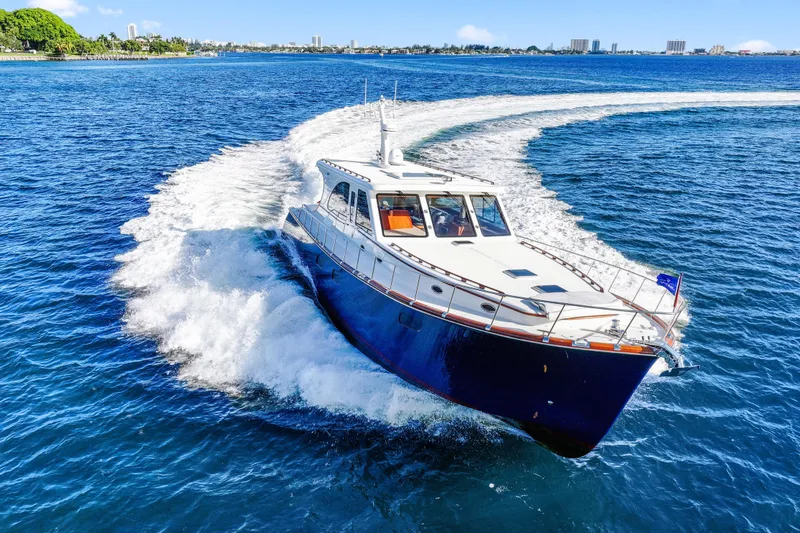 Slide: The Image of 2023 Vicem 65 Classic yacht cruising on blue ocean waters. - 11