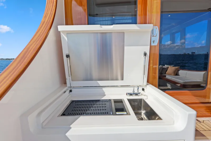 Slide: The Image of Outdoor kitchen on 2023 Vicem 65 Classic yacht with sink and grill, ocean view. - 16