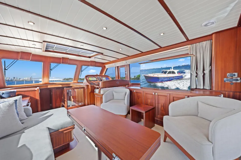 Slide: The Image of Luxurious interior of 2023 Vicem 65 Classic yacht with elegant wood finish and comfortable seating. - 20