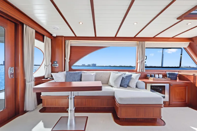 Slide: The Image of Luxurious interior of 2023 Vicem 65 Classic yacht with elegant wood finish and plush seating. - 23