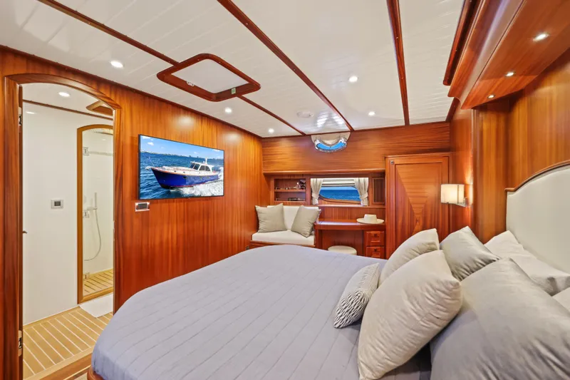 Slide: The Image of Luxurious cabin interior of 2023 Vicem 65 Classic yacht with elegant wood finish. - 33