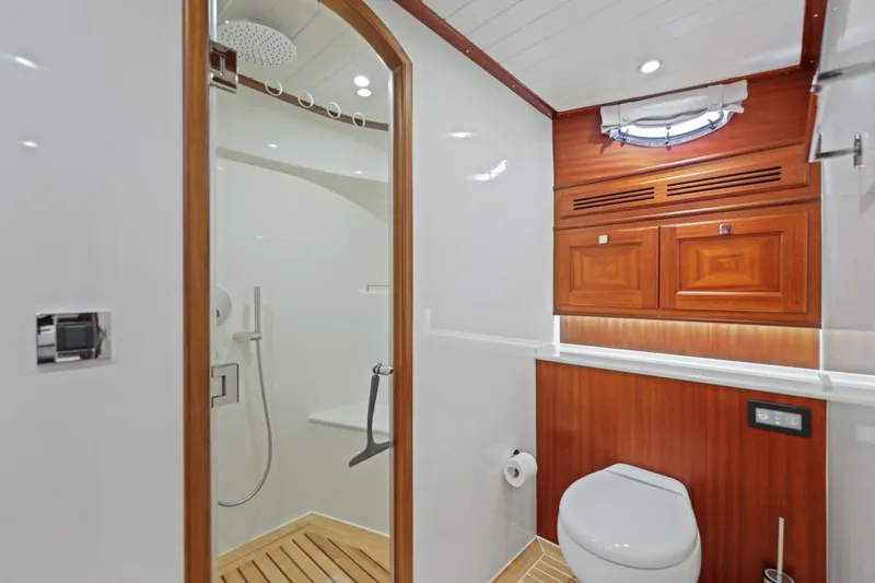 Slide: The Image of Luxurious bathroom in 2023 Vicem 65 Classic yacht, featuring wood accents and modern fixtures. - 37