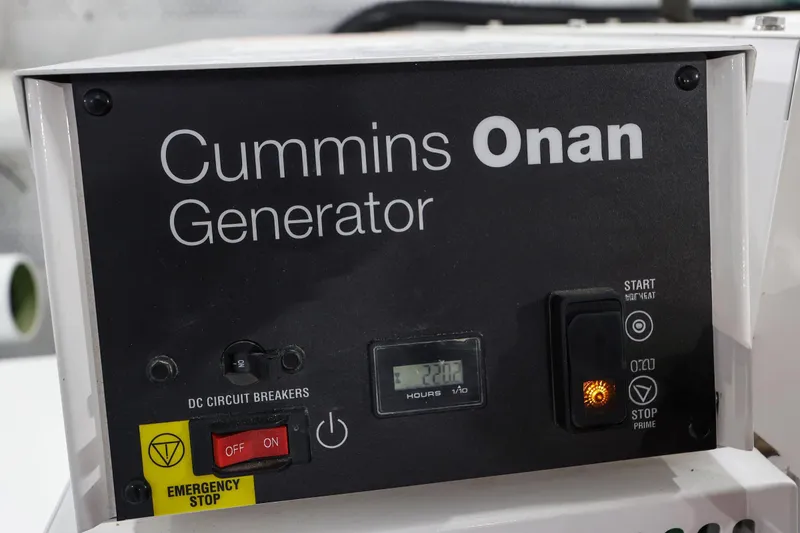 Slide: The Image of Cummins Onan generator control panel on 2023 Vicem 65 Classic yacht. - 47