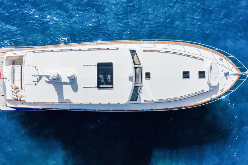 Slide: The Image of Aerial view of 2023 Vicem 65 Classic yacht on clear blue water. - 7