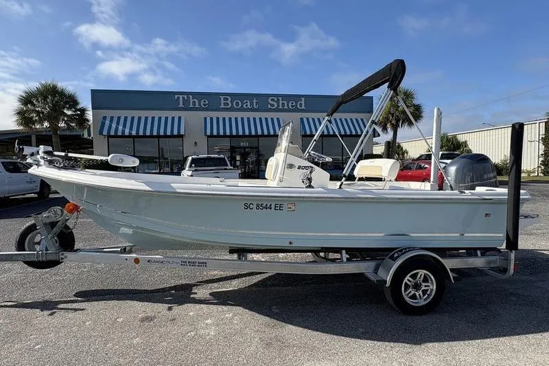Slide: The Image of 2025 Bulls Bay 2000 boat on trailer outside The Boat Shed dealership. - 0