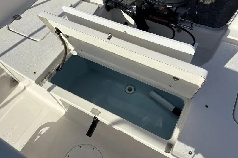 Slide: The Image of Open storage compartment on a 2025 Bulls Bay 2000 boat, showcasing interior details. - 10