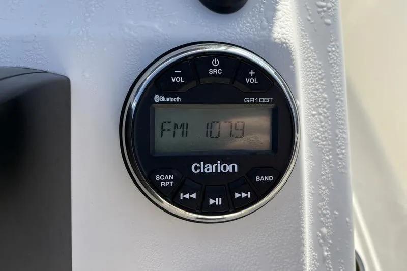 Slide: The Image of Clarion GR10BT radio on Bulls Bay 2000, 2025 model, displaying FM 107.9. - 16