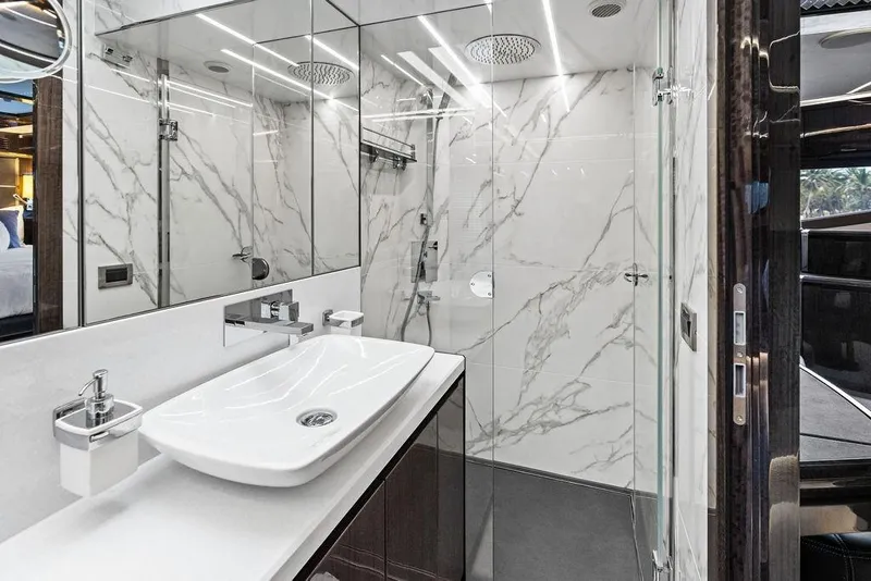 Slide: The Image of Luxurious bathroom in 2022 Galeon 640 Fly yacht with marble walls and modern fixtures. - 100