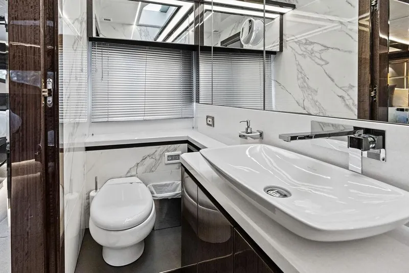 Slide: The Image of Luxurious bathroom in 2022 Galeon 640 Fly yacht with modern fixtures and marble accents. - 101