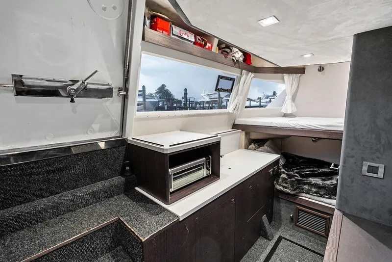 Slide: The Image of Luxurious interior of 2022 Galeon 640 Fly yacht with modern amenities and cozy sleeping area. - 103