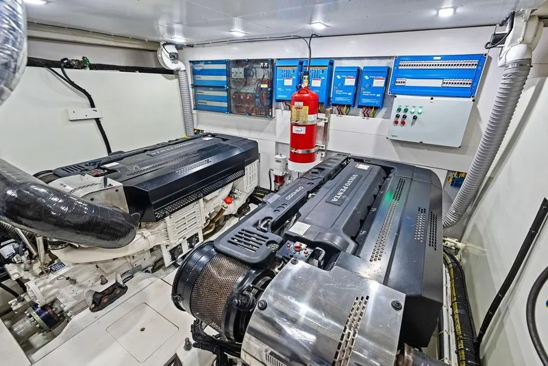 Slide: The Image of Engine room of 2022 Galeon 640 Fly yacht with advanced machinery and control panels. - 105