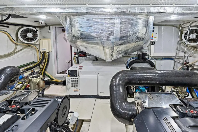 Slide: The Image of Engine room of 2022 Galeon 640 Fly yacht with advanced machinery and ventilation systems. - 107