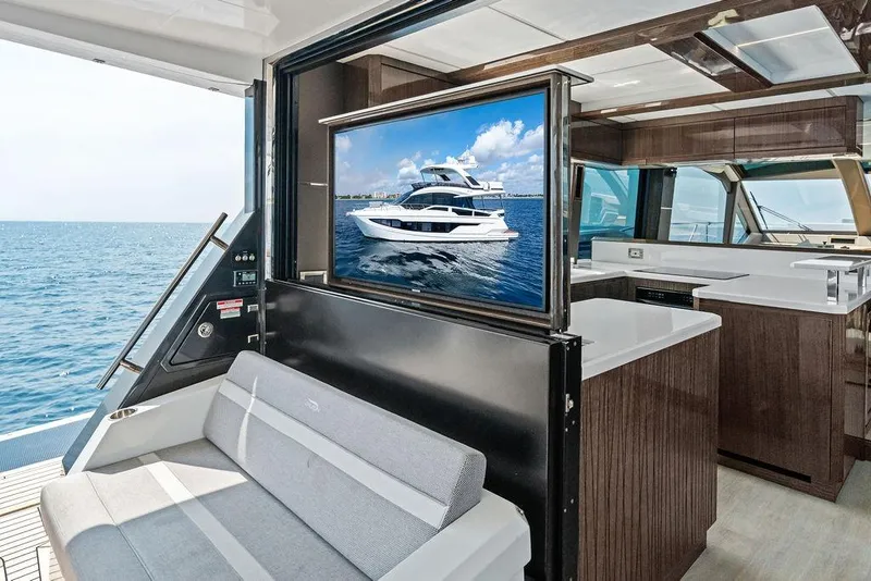 Slide: The Image of Luxurious 2022 Galeon 640 Fly yacht interior with ocean view and modern amenities. - 28