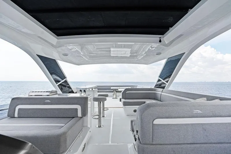 Slide: The Image of Luxurious 2022 Galeon 640 Fly yacht interior with modern seating and ocean view. - 34
