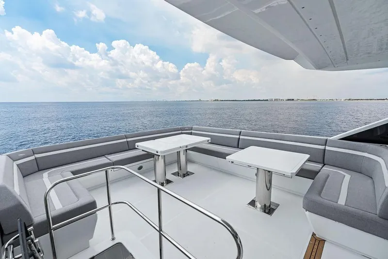 Slide: The Image of Luxury deck of 2022 Galeon 640 Fly yacht with ocean view and seating area. - 38