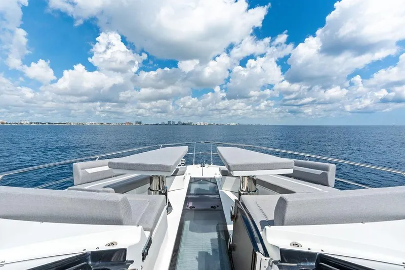Slide: The Image of Luxurious 2022 Galeon 640 Fly yacht deck with ocean view and blue sky. - 48