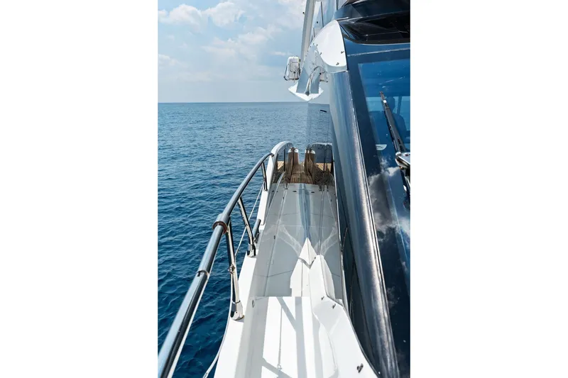 Slide: The Image of 2022 Galeon 640 Fly yacht deck with ocean view and sleek design. - 53