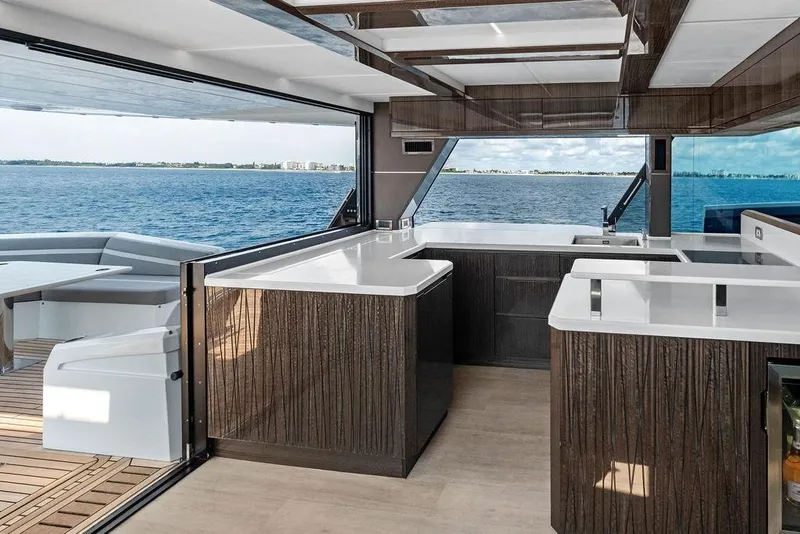 Slide: The Image of Luxurious 2022 Galeon 640 Fly yacht interior with modern kitchen and ocean view. - 59