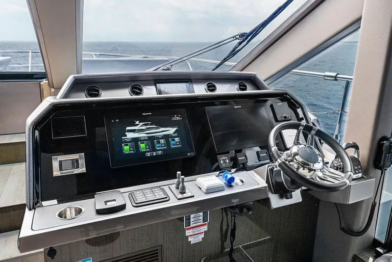 Slide: The Image of Control panel of 2022 Galeon 640 Fly yacht with modern navigation system. - 76