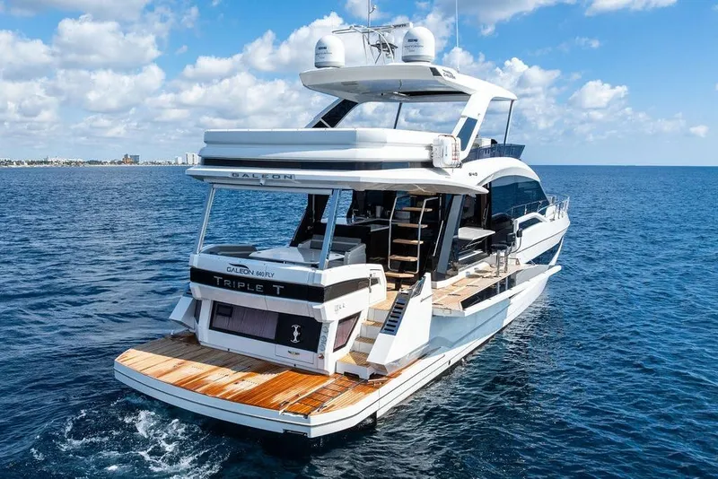 Slide: The Image of Luxurious 2022 Galeon 640 Fly yacht cruising on open sea under blue skies. - 8