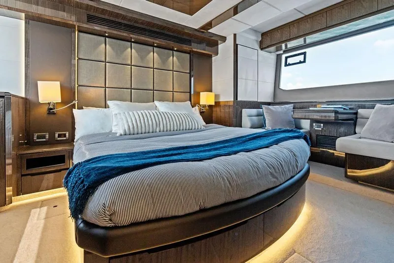 Slide: The Image of Luxurious bedroom interior of 2022 Galeon 640 Fly yacht with modern design and ambient lighting. - 82