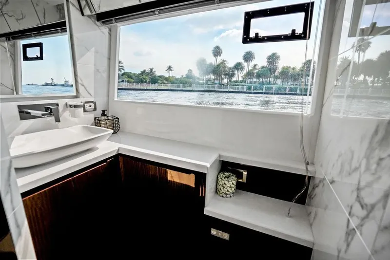 Slide: The Image of Luxurious bathroom interior of 2022 Galeon 640 Fly yacht with ocean view. - 86
