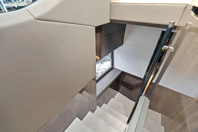 Slide: The Image of Staircase inside 2022 Galeon 640 Fly yacht, featuring modern design and sleek finishes. - 94