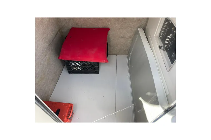 Slide: The Image of Electrical panel and battery compartment of 2003 Jupiter 27 boat. - 38